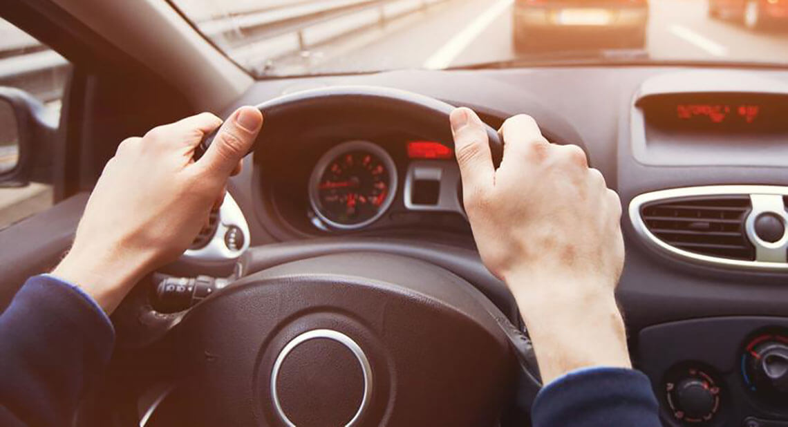 Hands on steering wheel
