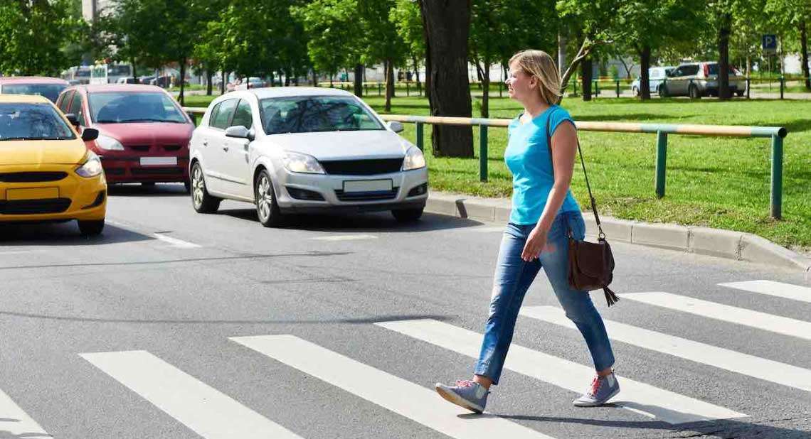 Woman crossing road