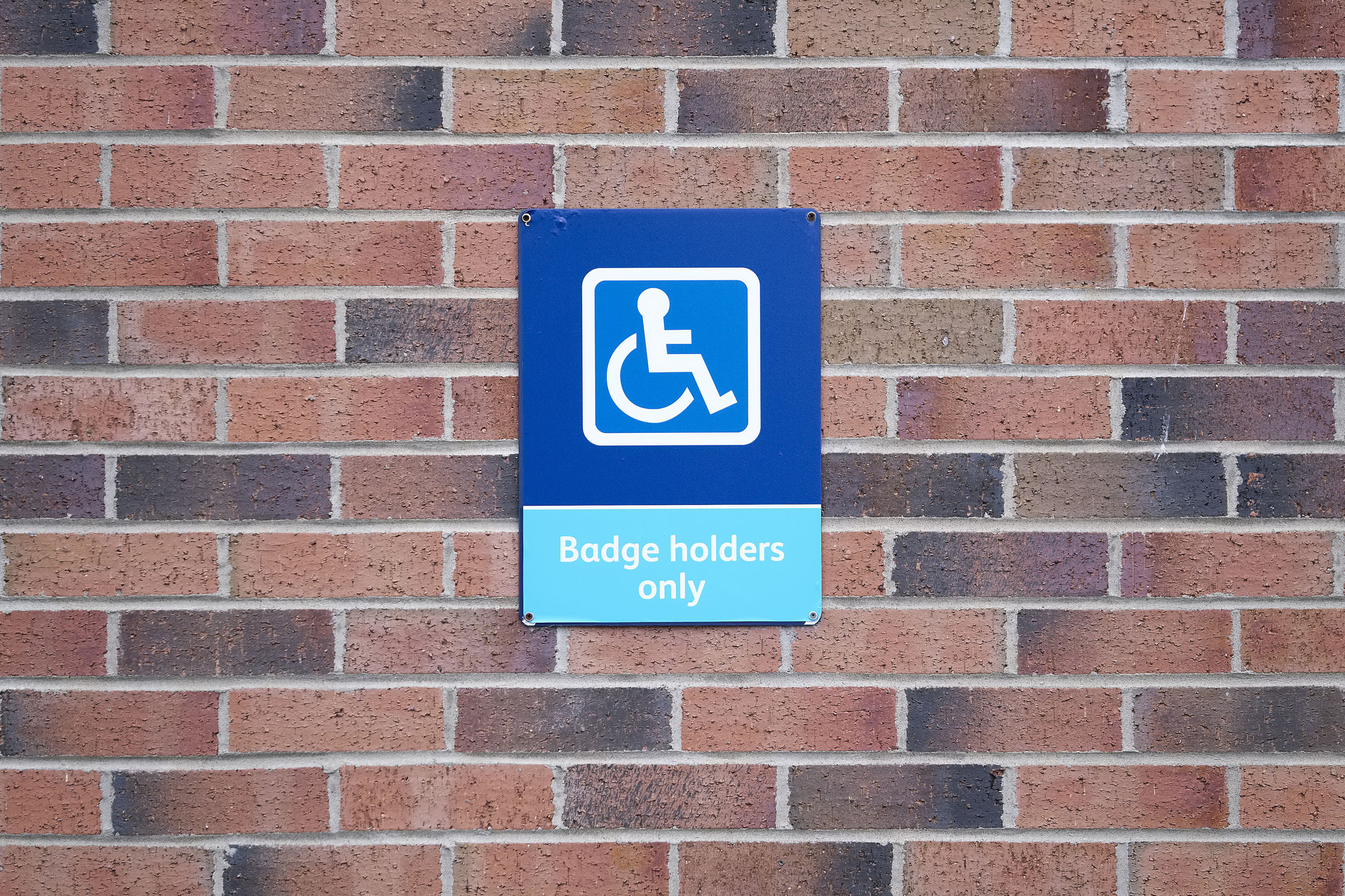 Disabled parking blue badge holders only