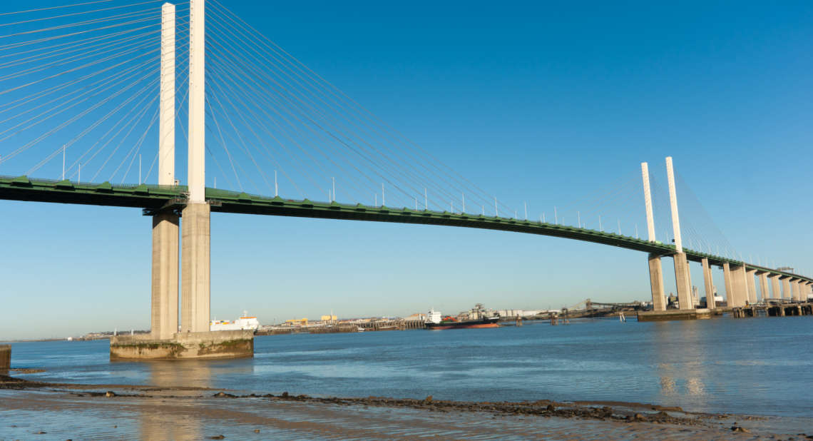 Queen Elisabeth II bridge over the river Thames, in West Thurrock, UK against a clear blue sky