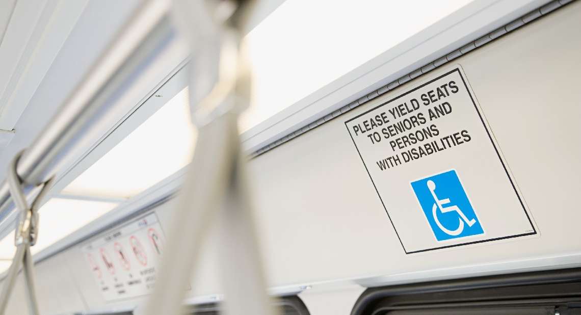 View inside a train showing a disability sticker