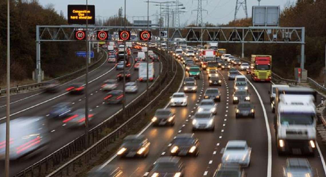 Taxed vehicles, cars and lorries at rush hour on road