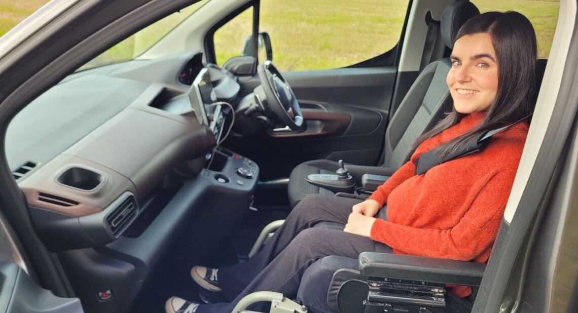 Emma Muldoon in her Wheelchair Accessible Vehicle (WAV)