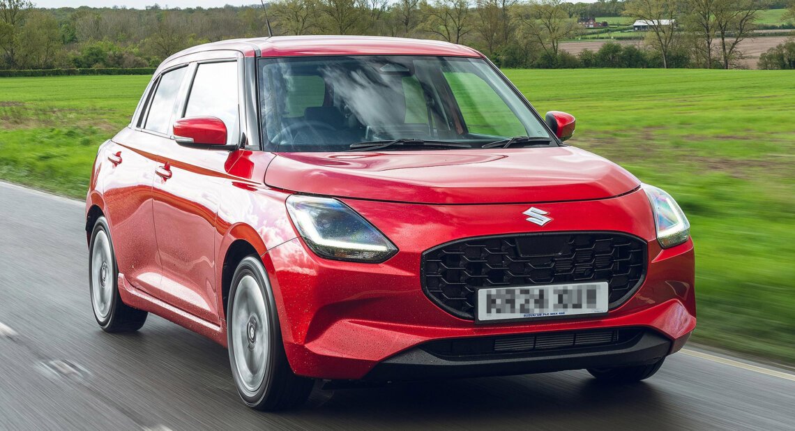 Red suzuki swift car