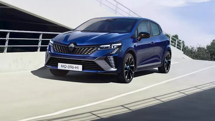 Front-side view of a blue Renault Clio parked on a modern ramp structure, featuring sporty alloy wheels and sleek LED headlights.